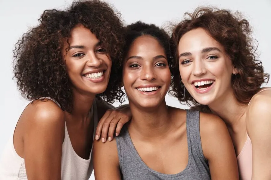 three women smiling